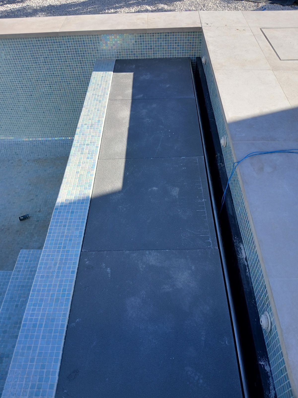 Installed pool cover built using the GFRP panel concept